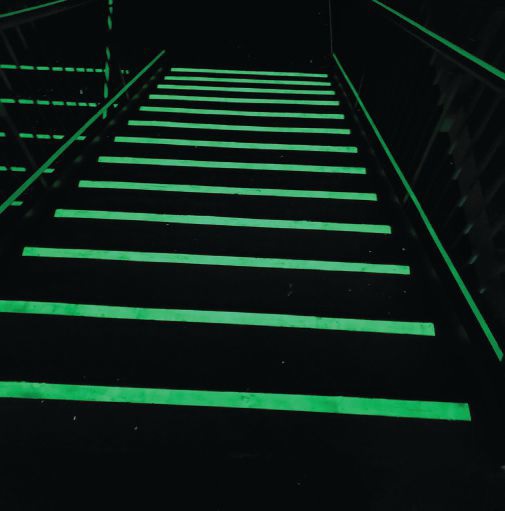 Darkened stairs with photoluminescent strips